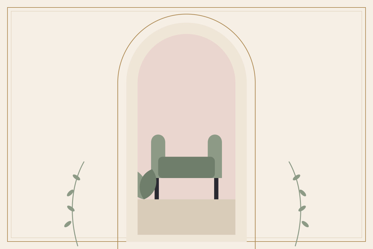 A green armchair beside a small plant