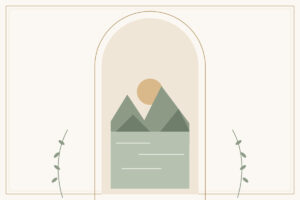 Mountains reflected in a still lake under a pale sun
