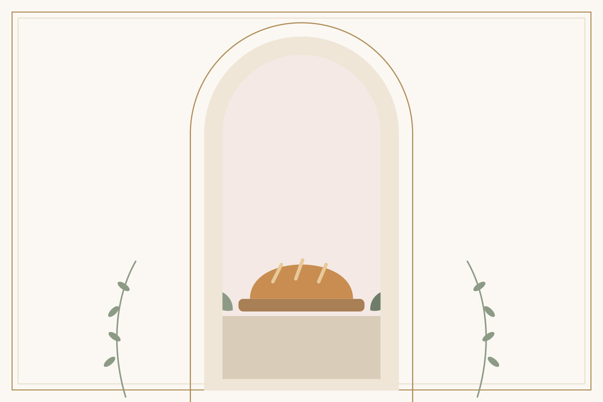 A golden loaf of bread resting on a wooden board