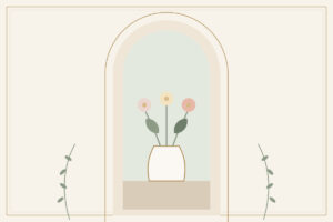 A white vase of soft flowers