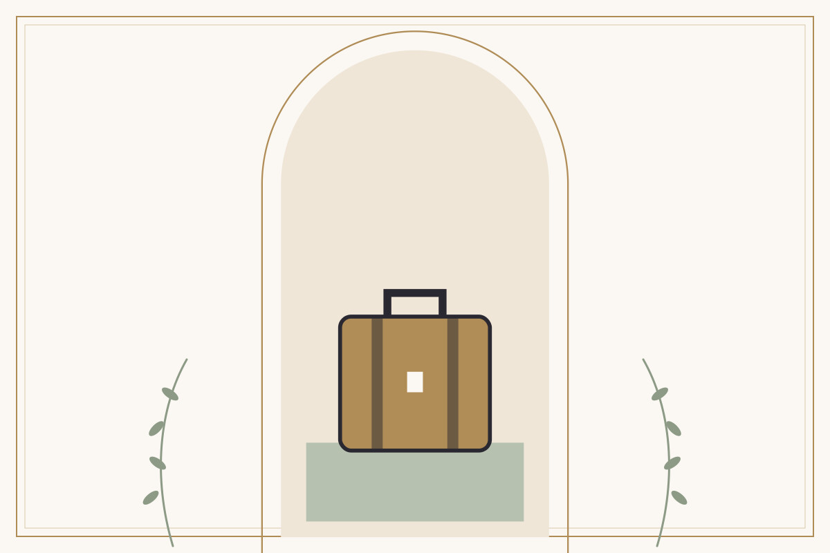 A tan suitcase with dark straps