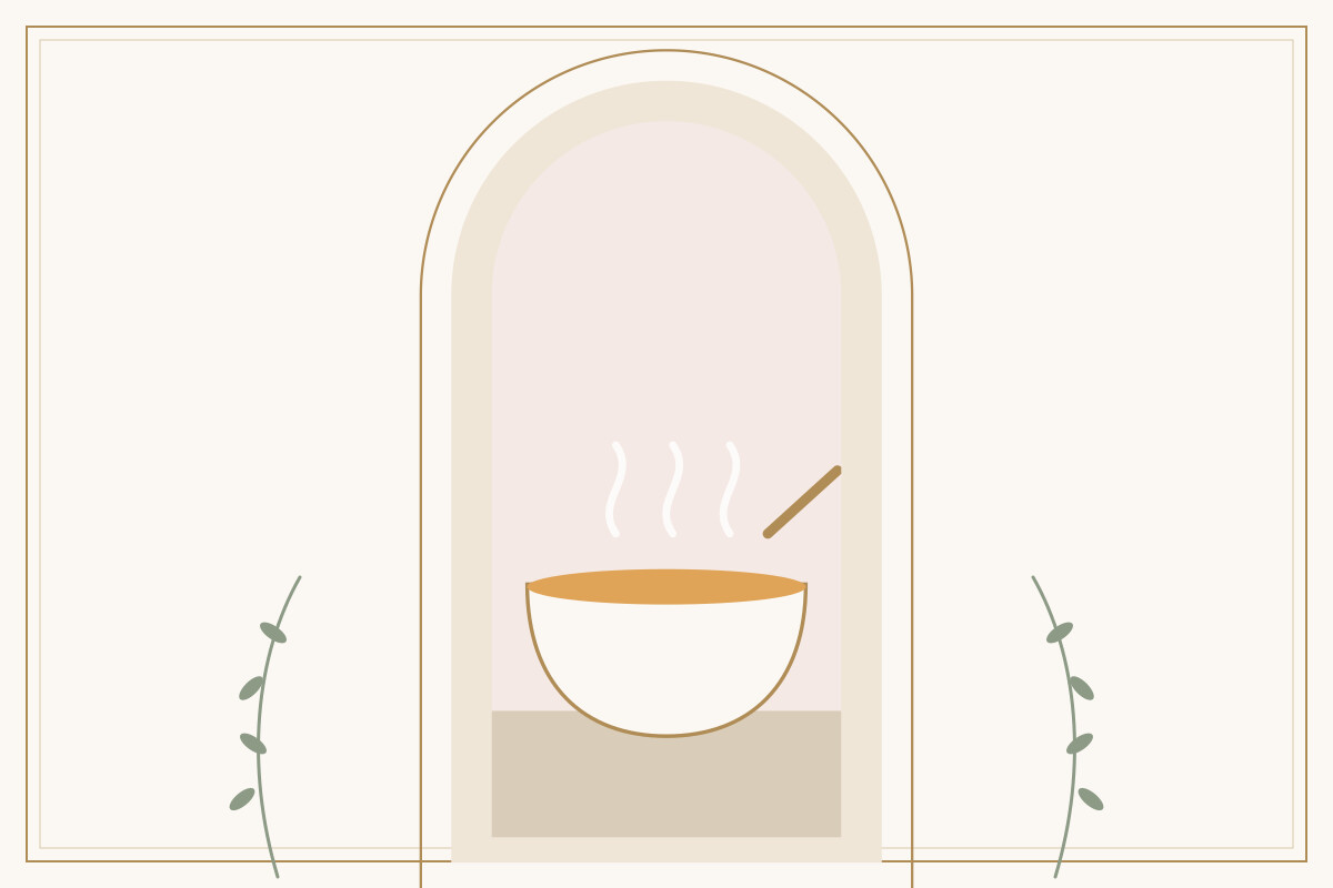 A steaming bowl of golden soup with a spoon